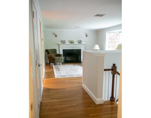 111 Sutton Road Needham, MA 02492 - Photo 6 of 30 a view of a living room with furniture and a fireplace