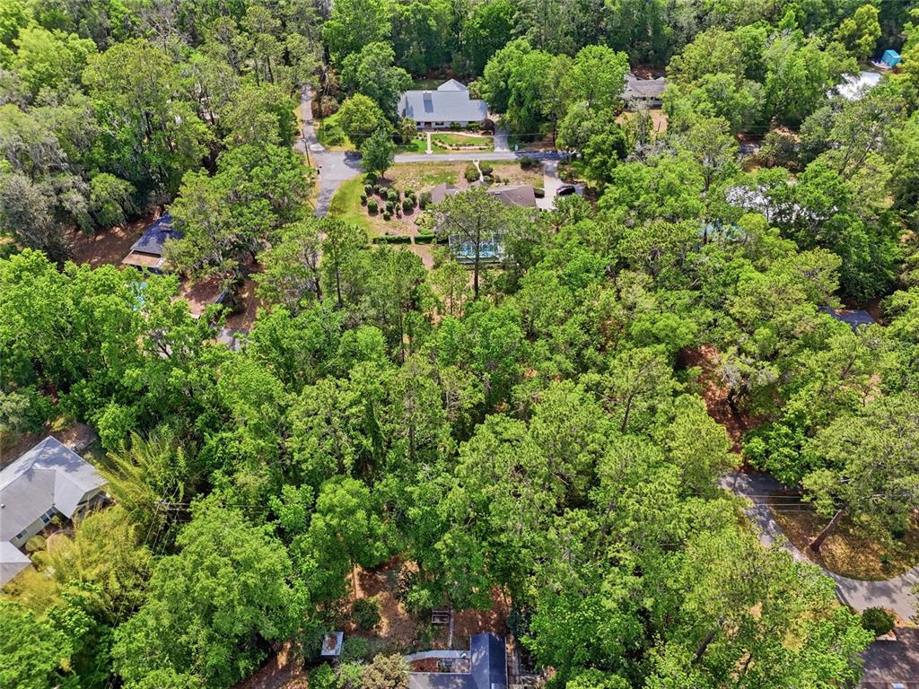 0 Northwest 45th Street Gainesville, FL 32607 - Photo 5 of 14 an aerial view of residential house with outdoor space and trees all around