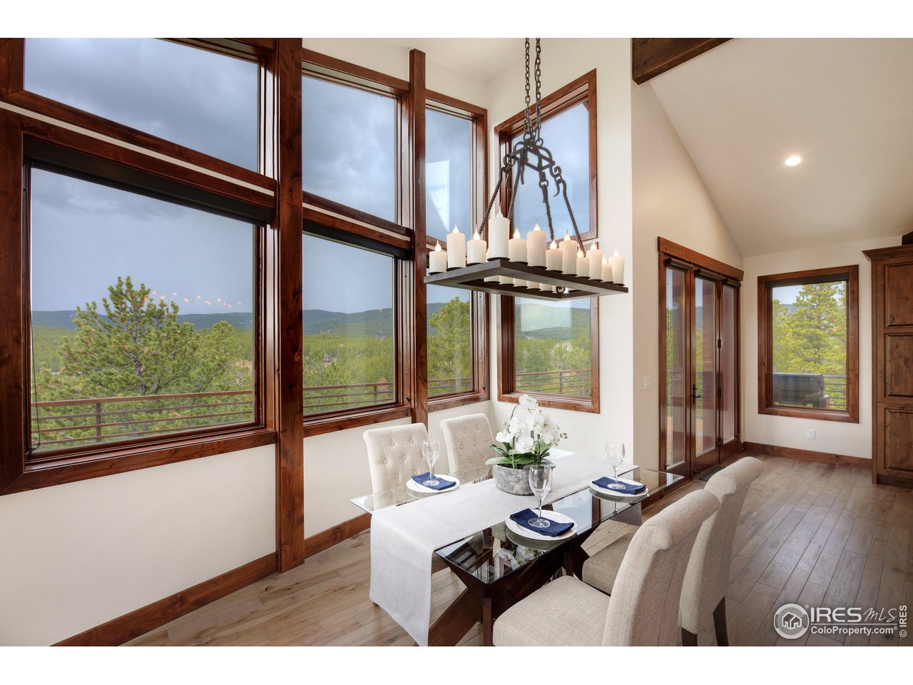 23 Ridge View Road Nederland, CO 80466 - Photo 11 of 38 a living room with furniture and a large window