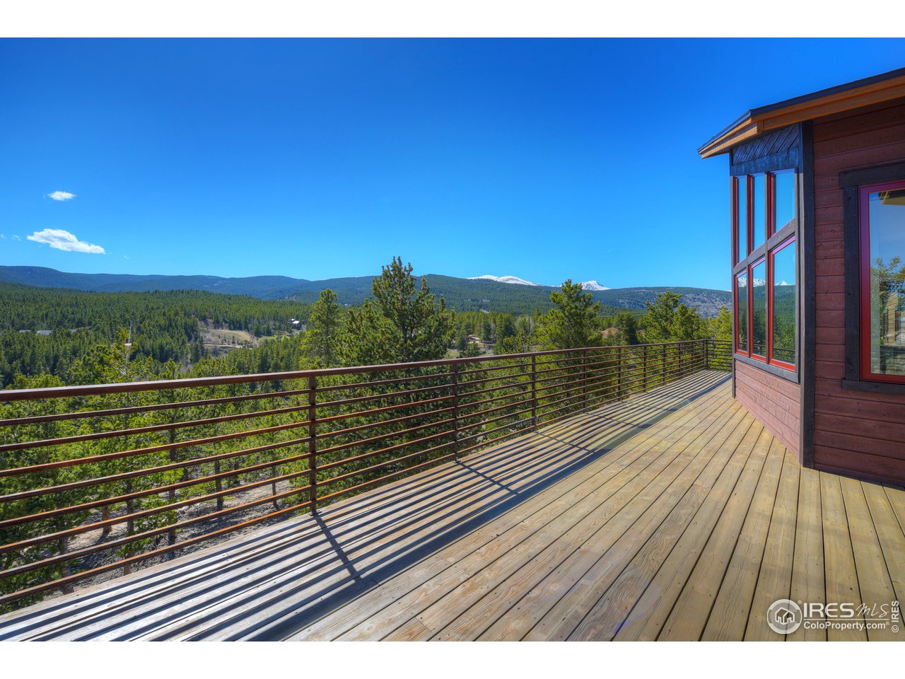 23 Ridge View Road Nederland, CO 80466 - Photo 14 of 38 a view of balcony with wooden floor and outdoor space