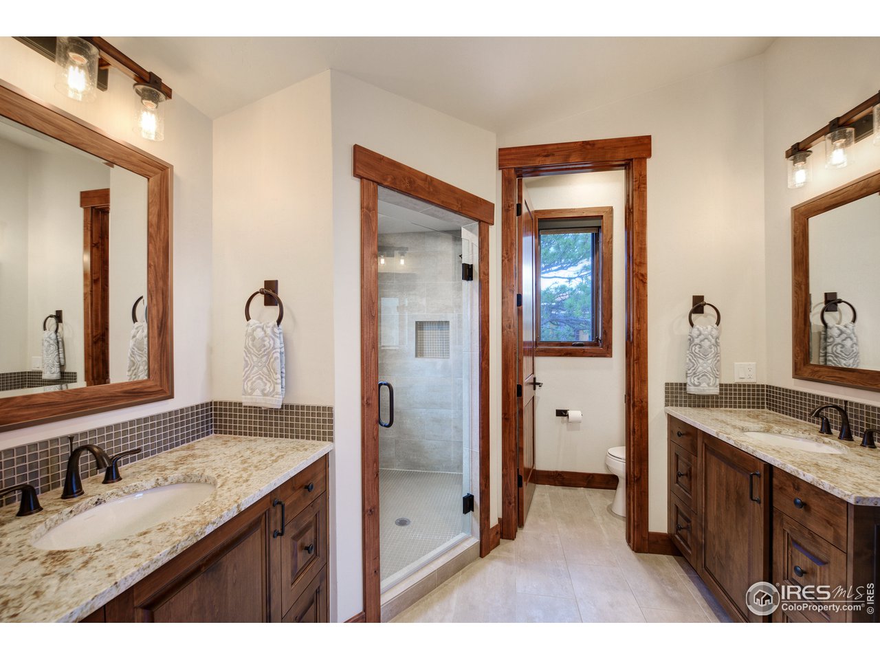 23 Ridge View Road Nederland, CO 80466 - Photo 21 of 38 a bathroom with a sink and a mirror