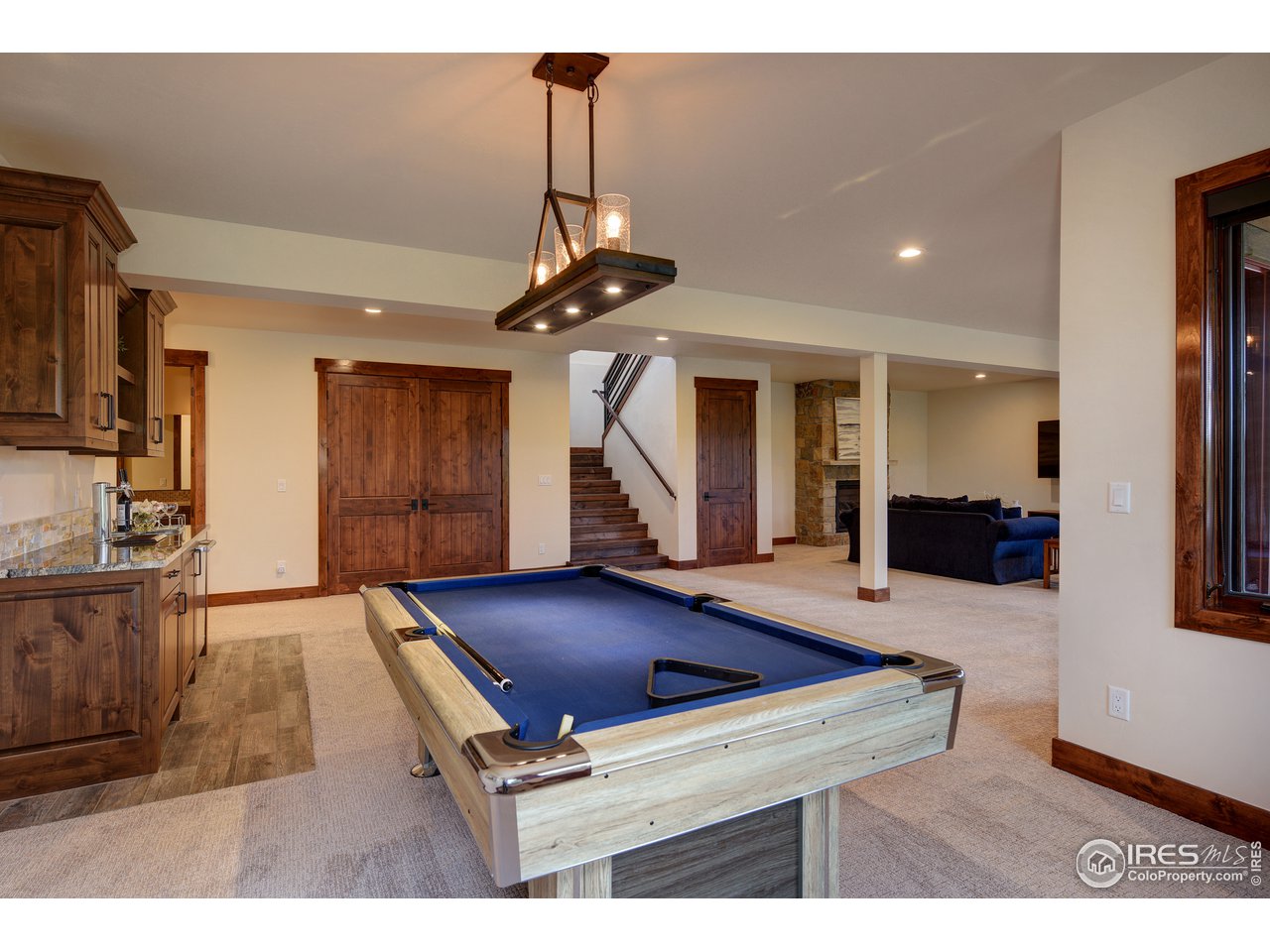 23 Ridge View Road Nederland, CO 80466 - Photo 24 of 38 a room with lots of furniture and a chandelier