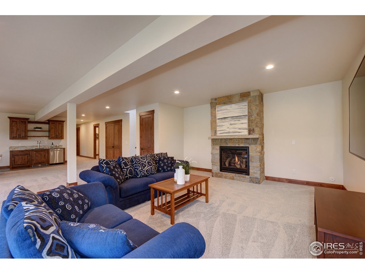 23 Ridge View Road Nederland, CO 80466 - Photo 25 of 38 a living room with furniture and a fireplace