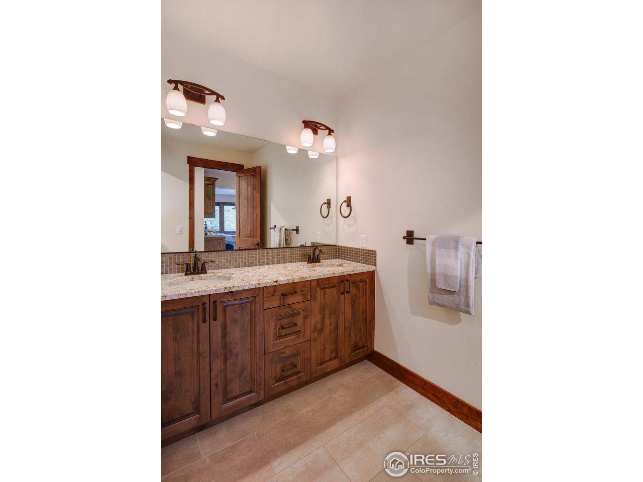 23 Ridge View Road Nederland, CO 80466 - Photo 29 of 38 a bathroom with a sink and a mirror