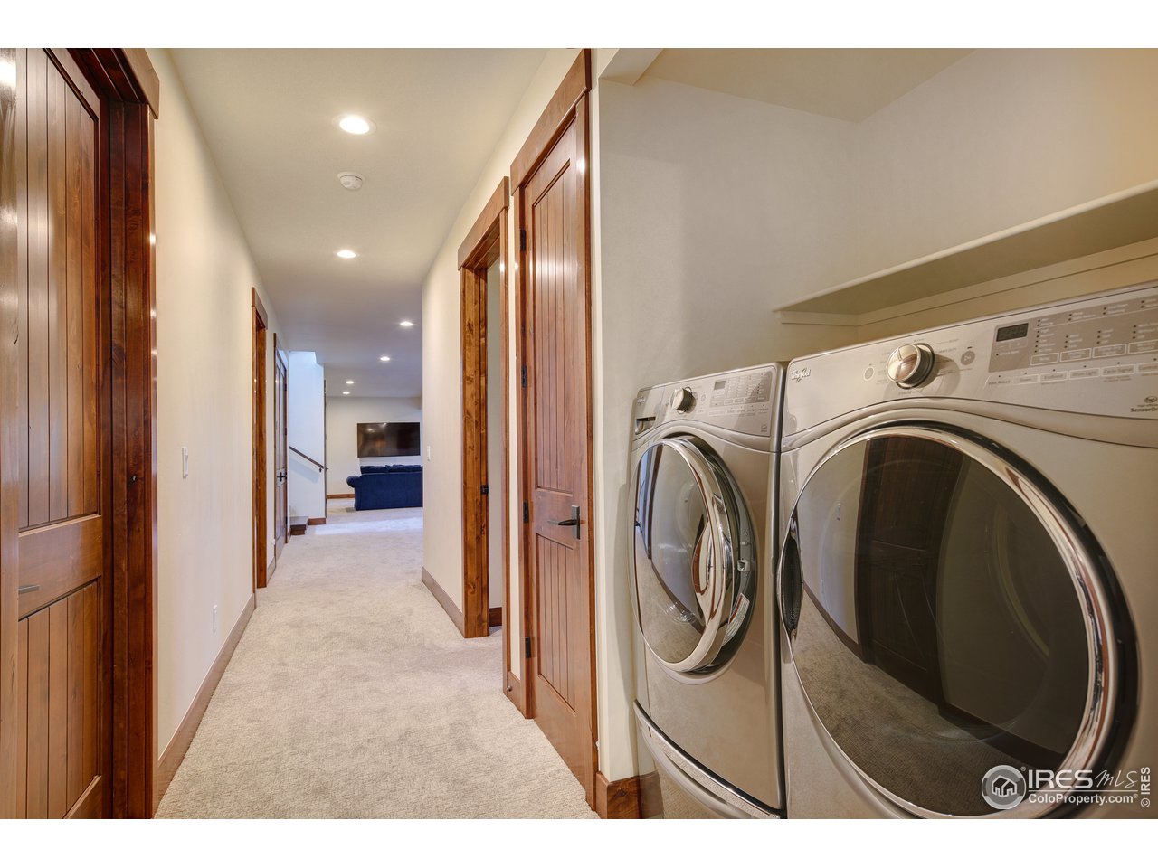 23 Ridge View Road Nederland, CO 80466 - Photo 30 of 38 a view of a hallway with washer and dryer