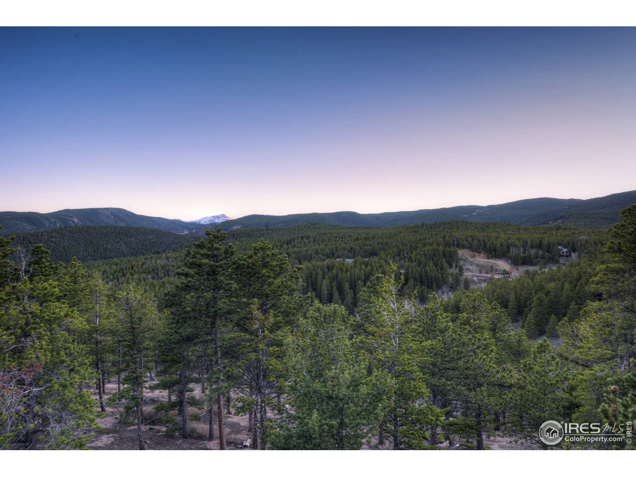 23 Ridge View Road Nederland, CO 80466 - Photo 37 of 38 a view of a city with lush green forest