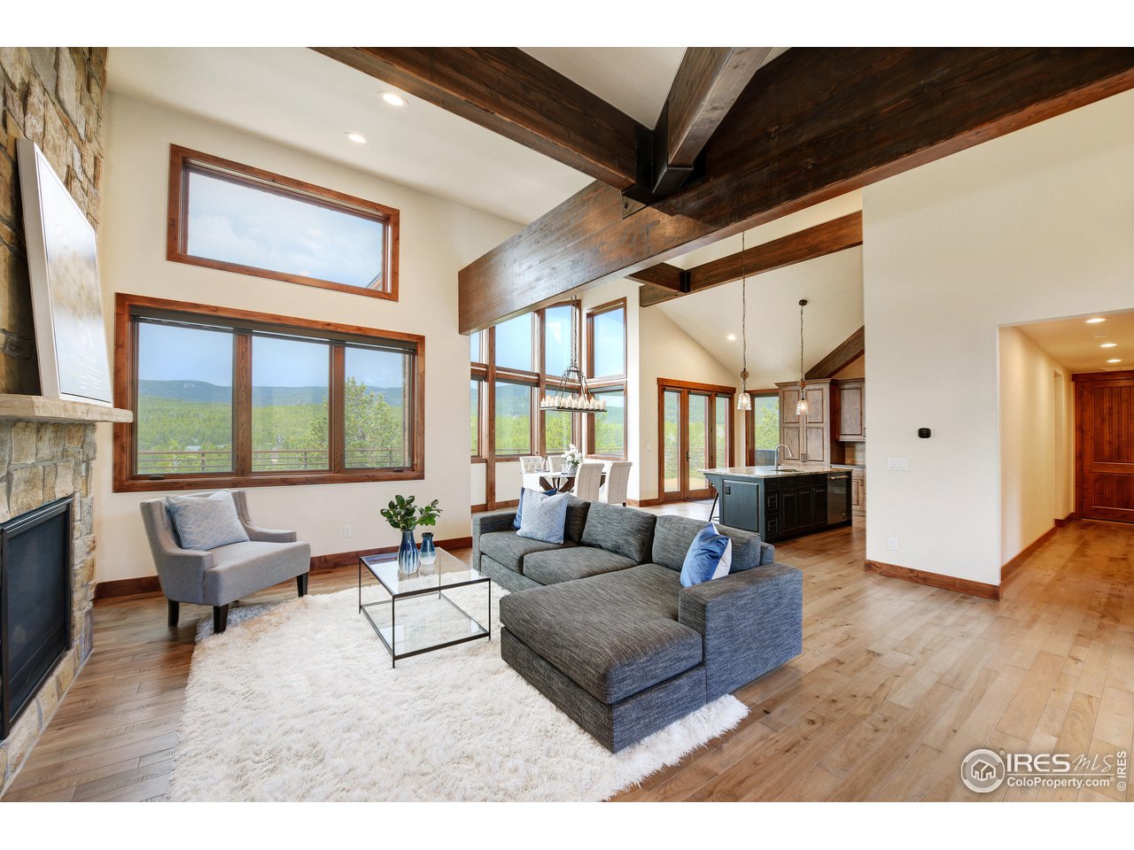 23 Ridge View Road Nederland, CO 80466 - Photo 4 of 38 a living room with furniture and a large window