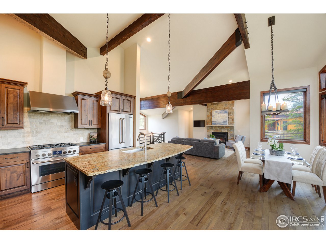 23 Ridge View Road Nederland, CO 80466 - Photo 6 of 38 a open kitchen with stainless steel appliances granite countertop a stove and refrigerator