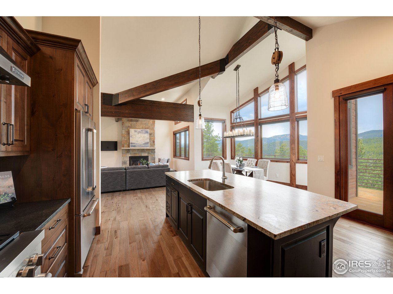 23 Ridge View Road Nederland, CO 80466 - Photo 7 of 38 a kitchen with sink cabinets and stove