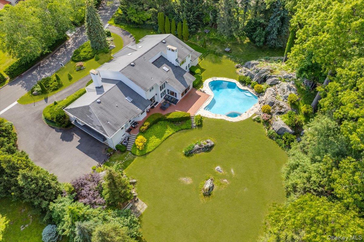 14 Lakeside Drive Rye, NY 10580 - Photo 25 of 33 an aerial view of a house with a swimming pool and garden