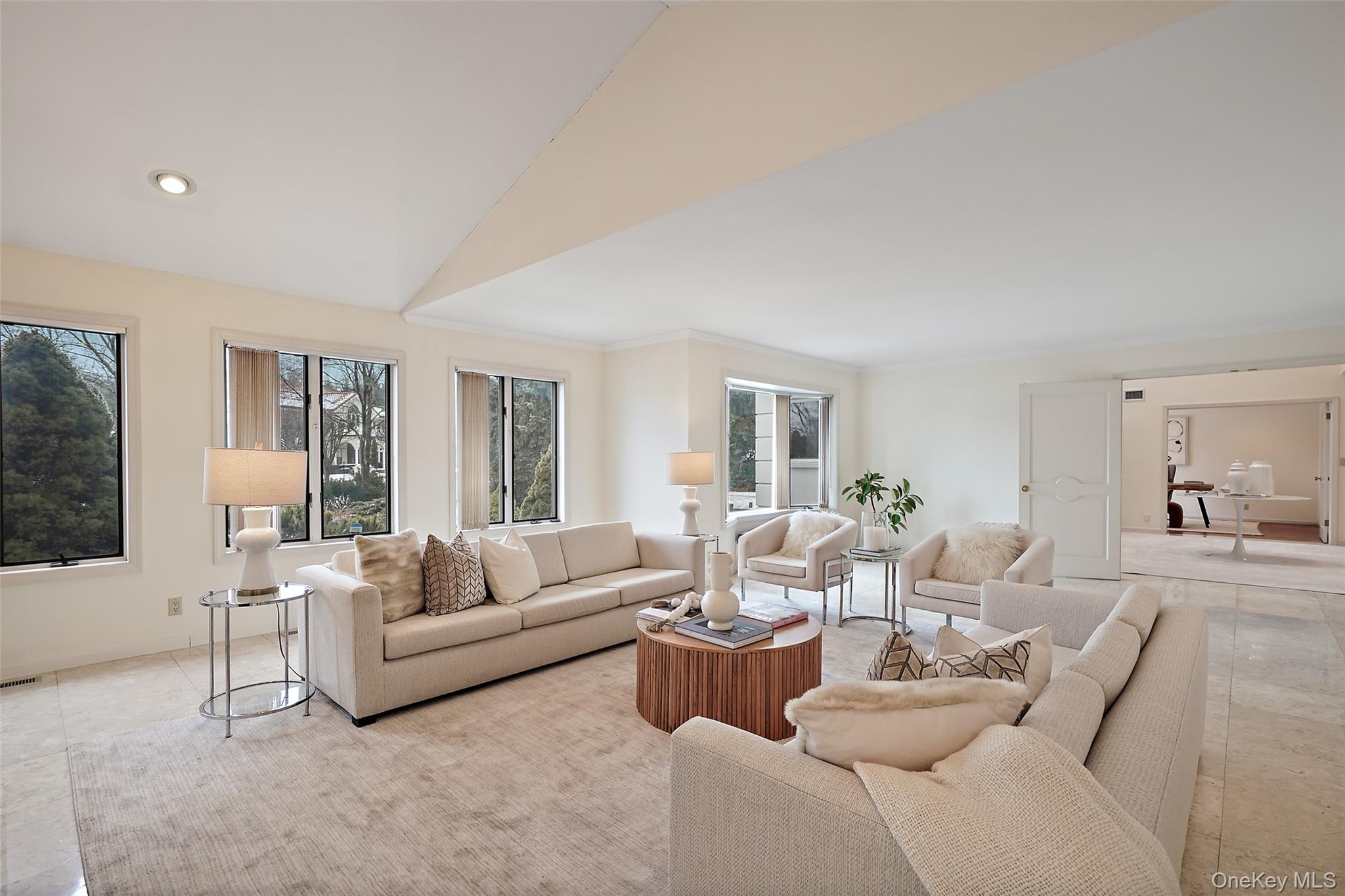 14 Lakeside Drive Rye, NY 10580 - Photo 6 of 33 a living room with furniture and a large window