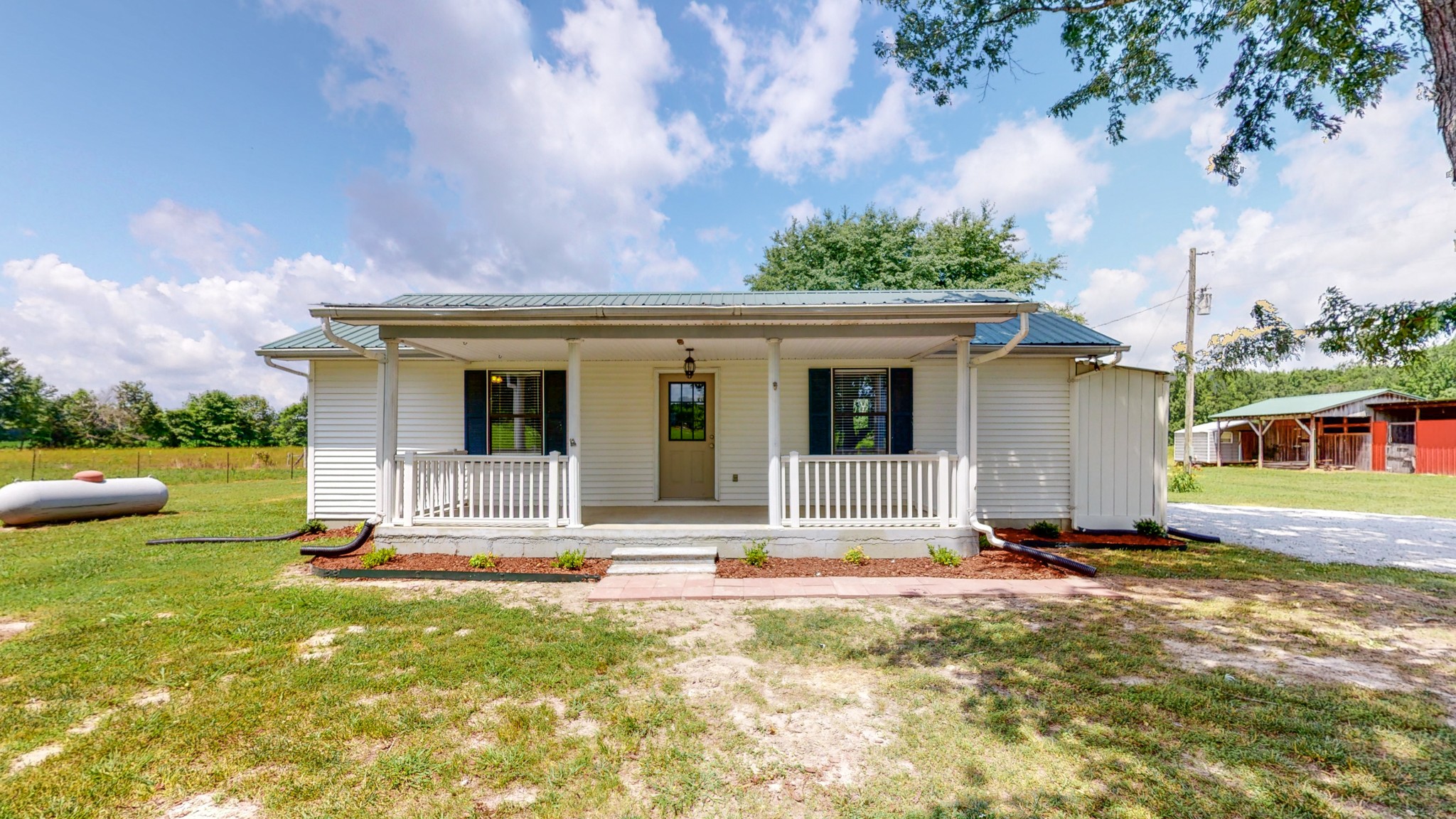 83 Hotel Road Flintville, TN 37335 - Photo 1 of 39 front view of a house with a yard