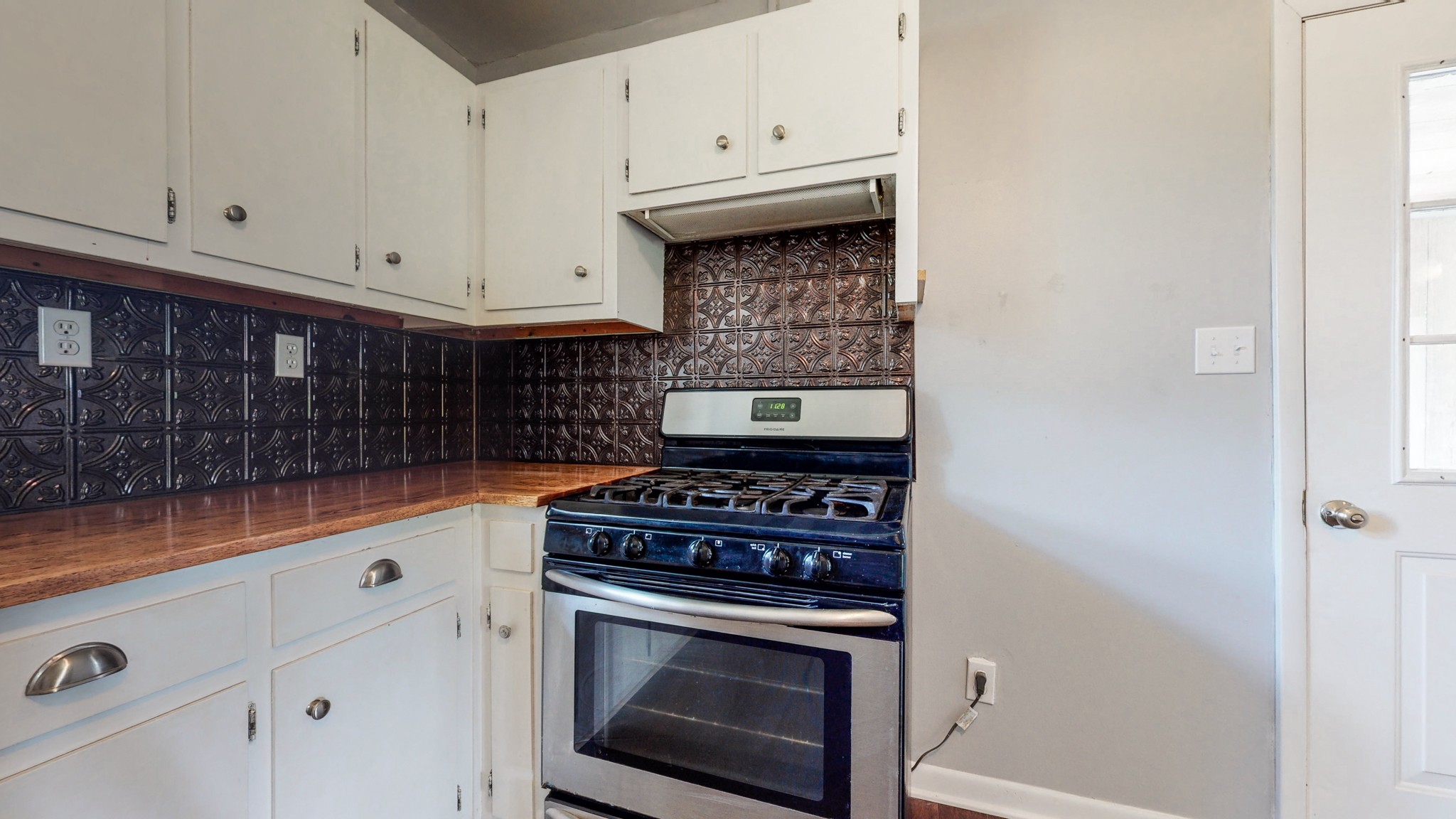 83 Hotel Road Flintville, TN 37335 - Photo 11 of 39 a kitchen with cabinets and appliances