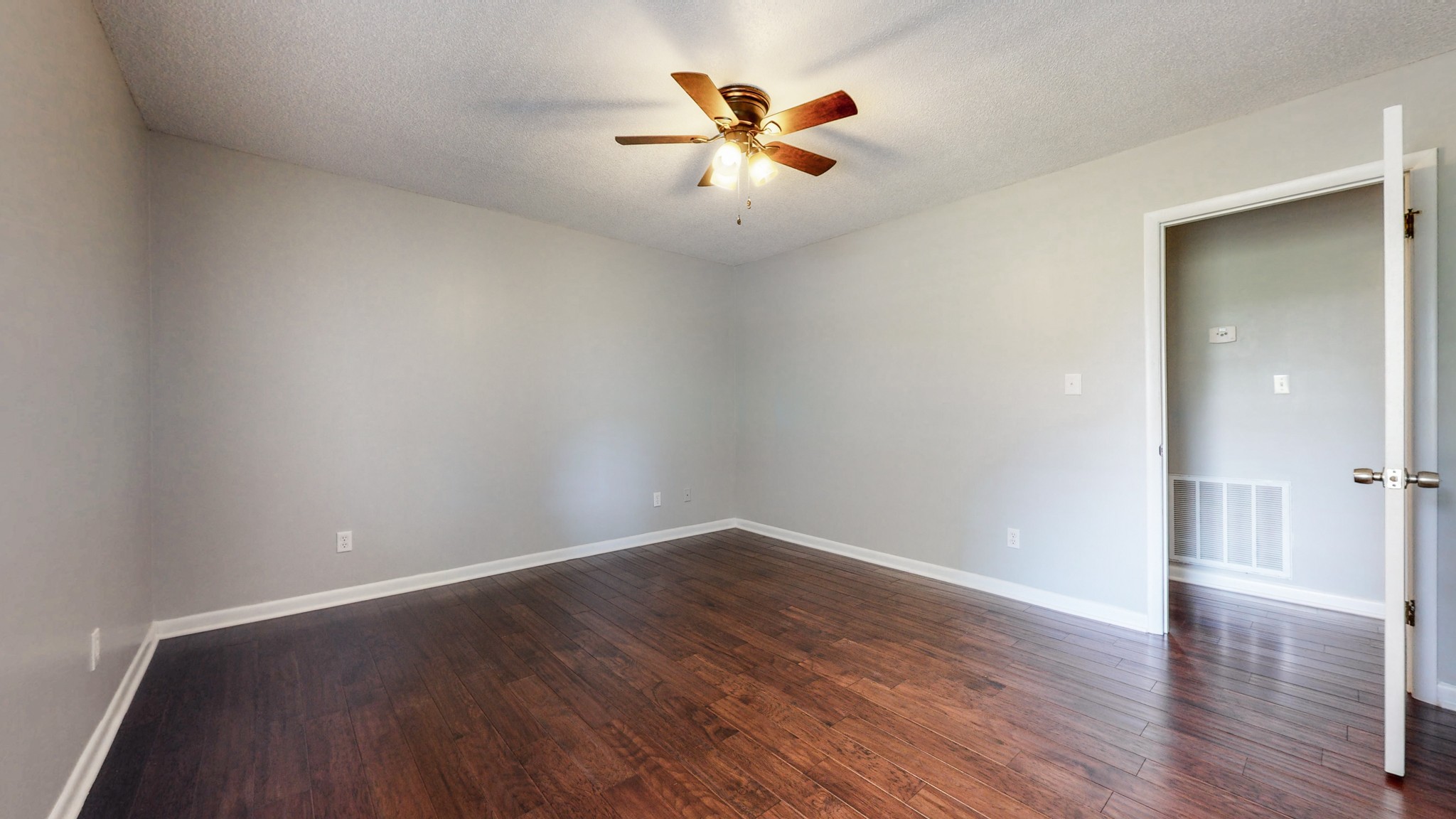 83 Hotel Road Flintville, TN 37335 - Photo 13 of 39 a view of an empty room with wooden floor