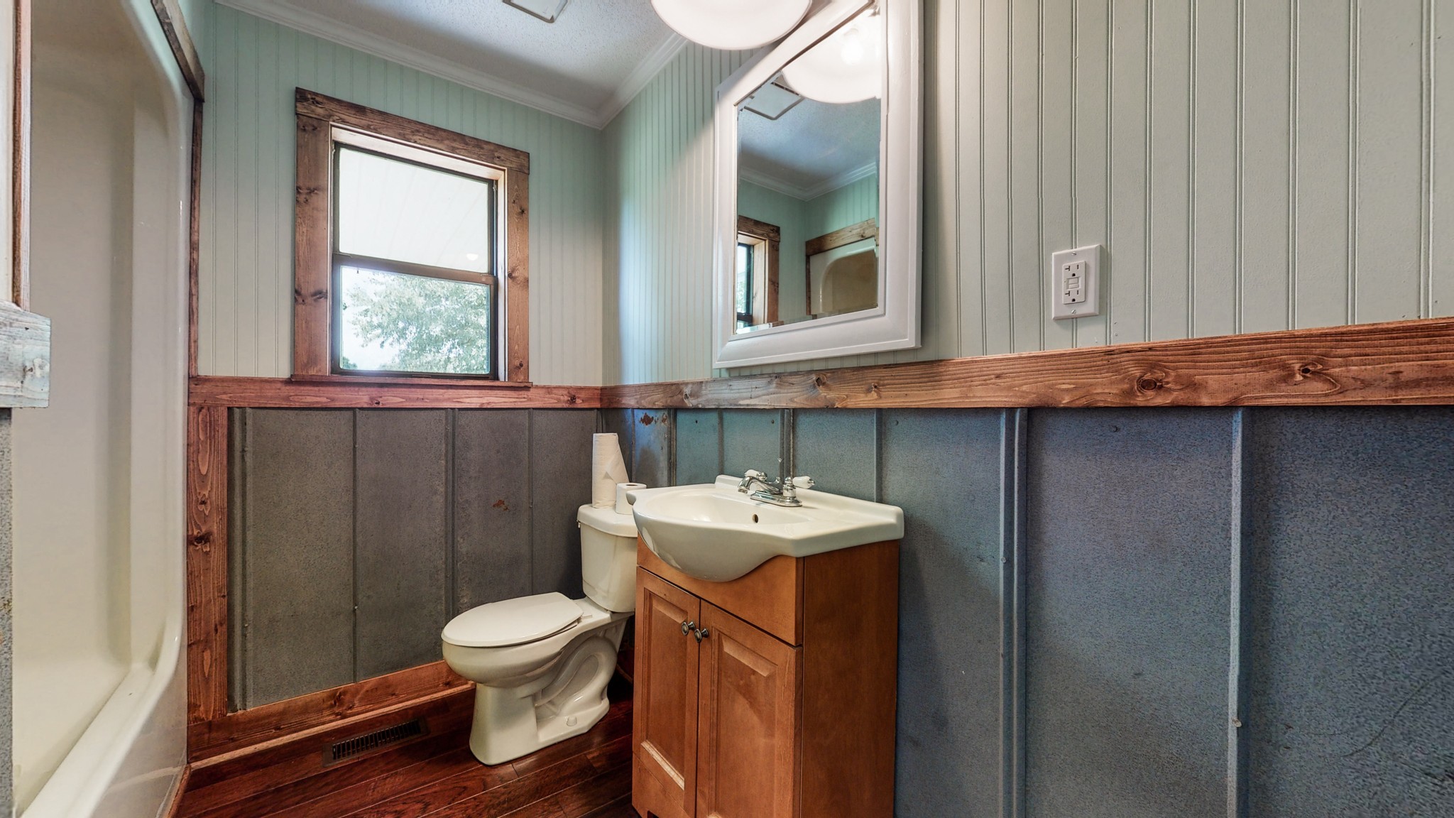 83 Hotel Road Flintville, TN 37335 - Photo 16 of 39 a bathroom with a sink a toilet and mirror