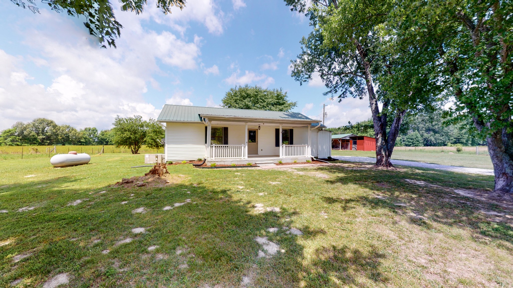83 Hotel Road Flintville, TN 37335 - Photo 19 of 39 a view of a house with pool and a garden