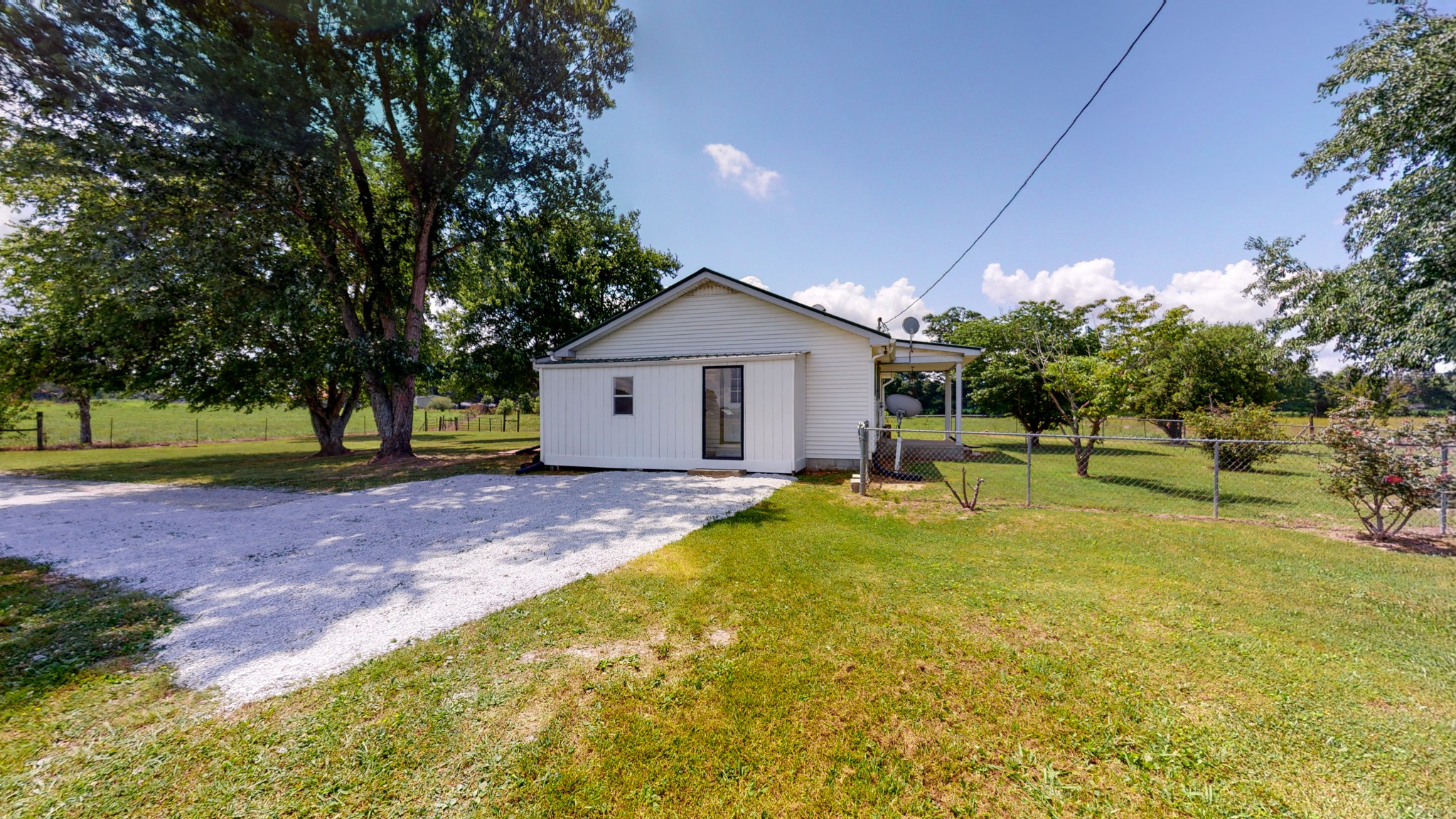 83 Hotel Road Flintville, TN 37335 - Photo 23 of 39 a view of a house with backyard and tree