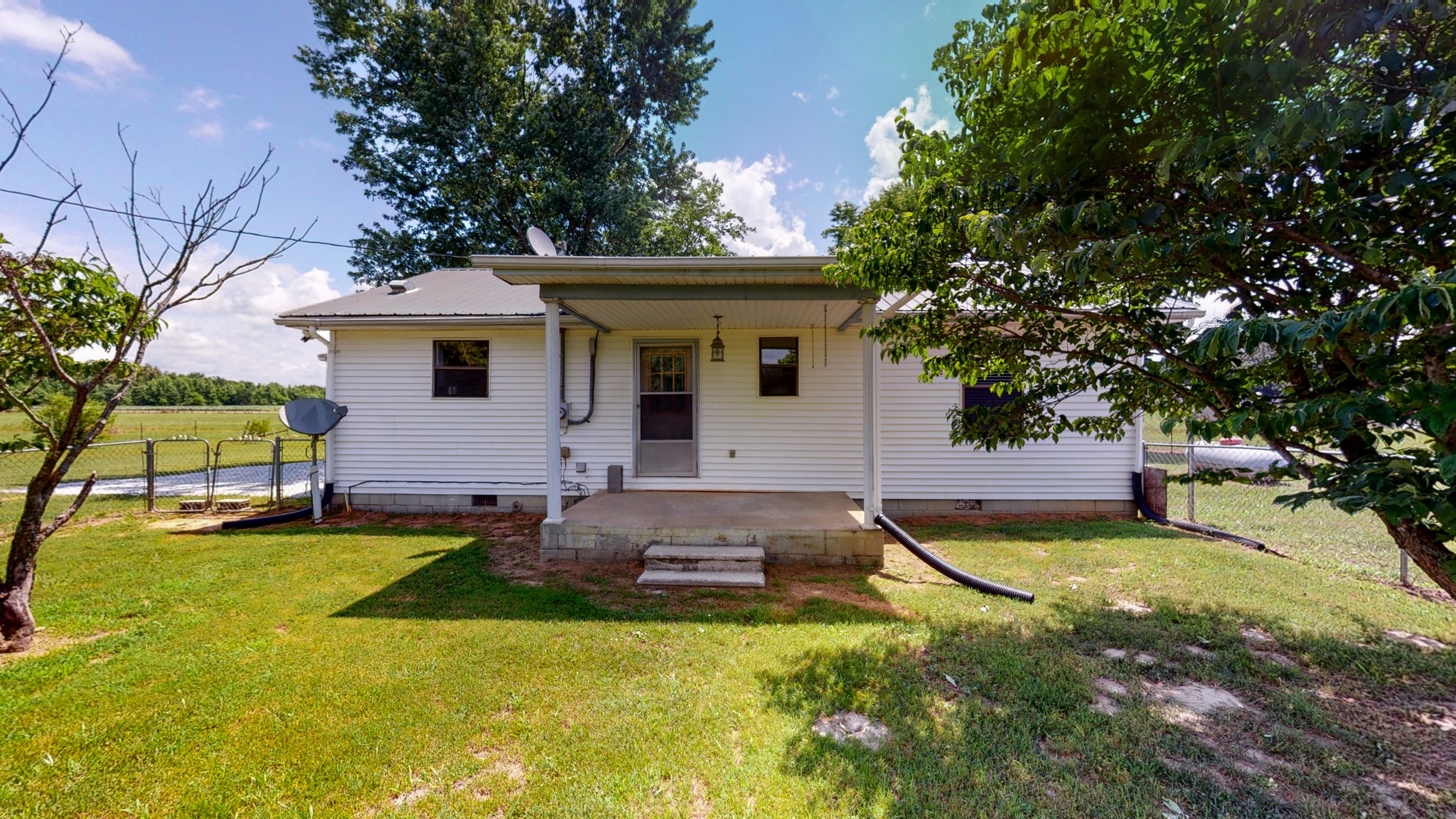 83 Hotel Road Flintville, TN 37335 - Photo 26 of 39 a view of a house with swimming pool and a yard