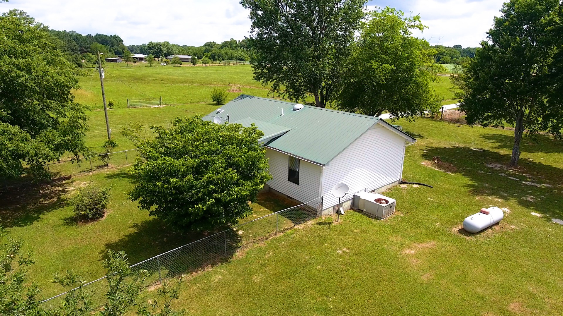 83 Hotel Road Flintville, TN 37335 - Photo 29 of 39 a aerial view of a house with a yard and lake view