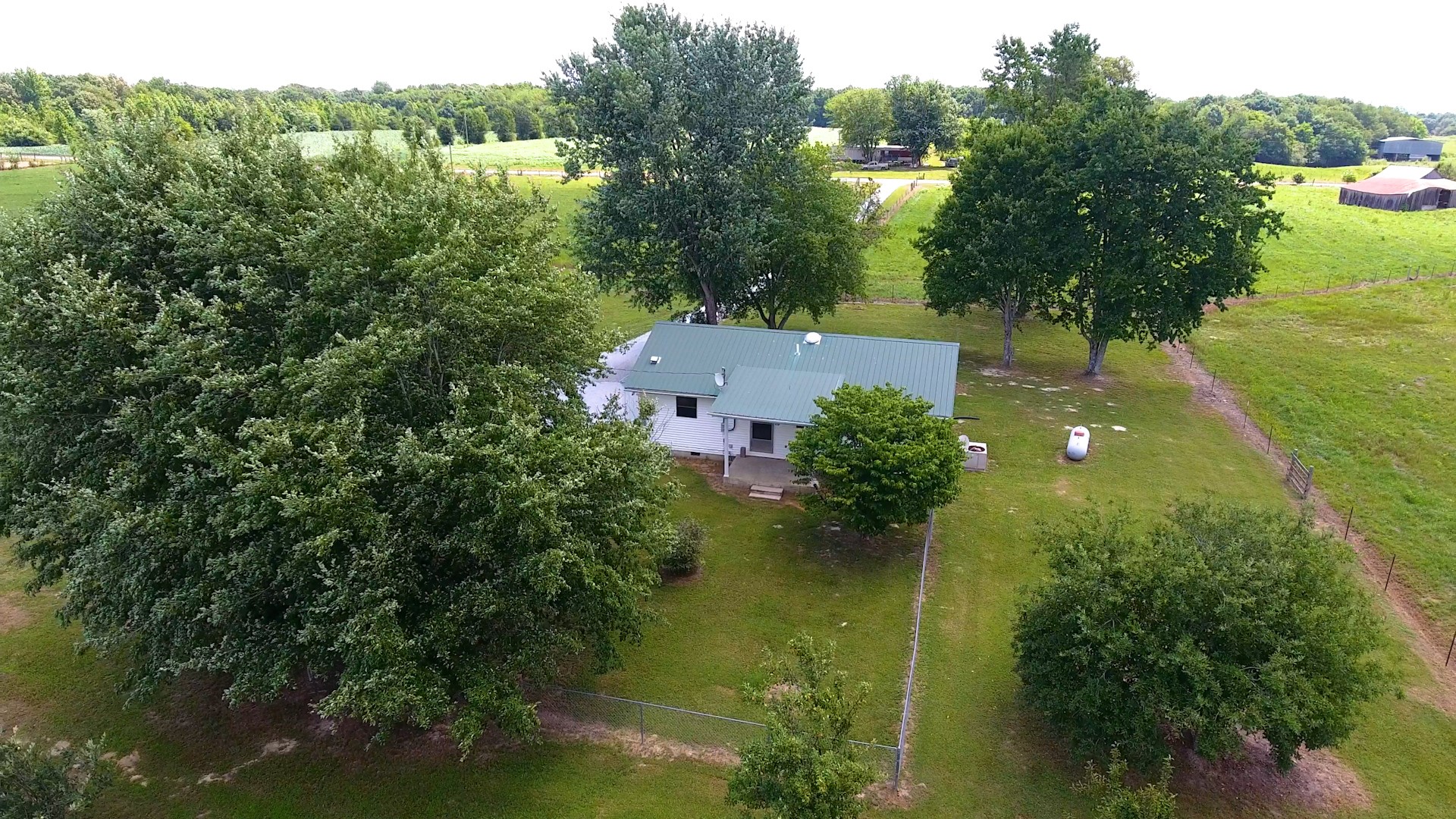83 Hotel Road Flintville, TN 37335 - Photo 30 of 39 an aerial view of house with yard swimming pool and outdoor seating