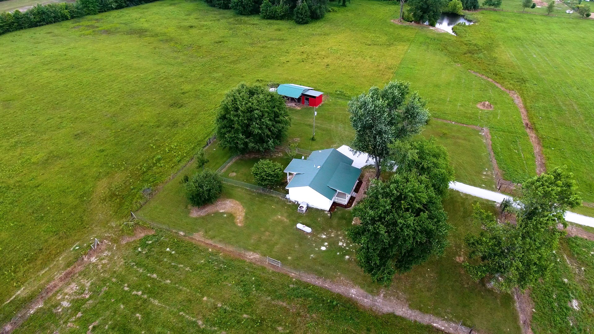83 Hotel Road Flintville, TN 37335 - Photo 31 of 39 a aerial view of a house with a yard