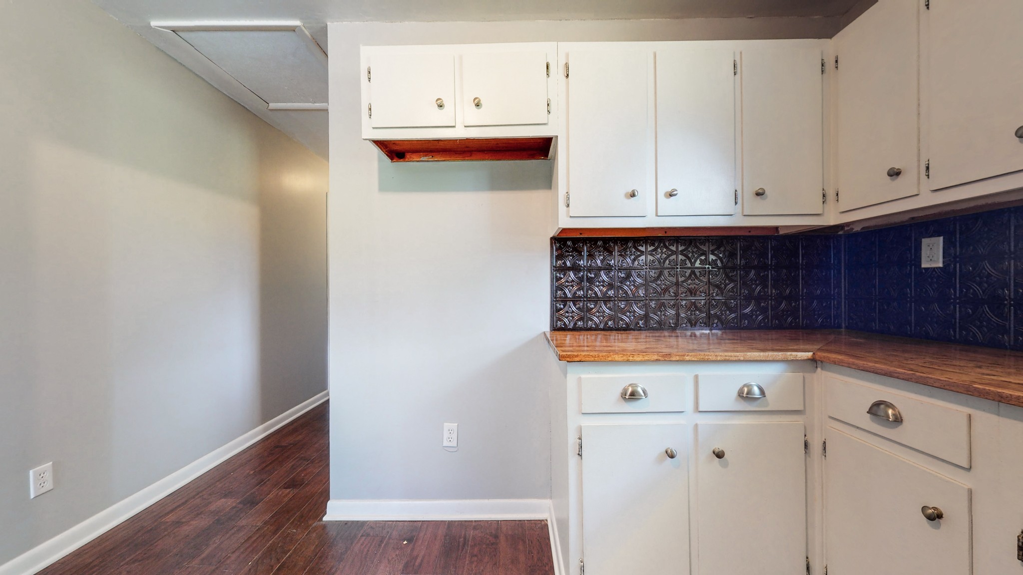 83 Hotel Road Flintville, TN 37335 - Photo 9 of 39 a view of cabinets and wooden floor