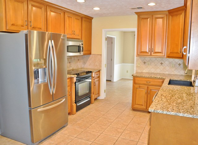 3915 Almond Road Fortson, GA 31808 - Photo 5 of 26 Updated kitchen with granite counter & tile floor