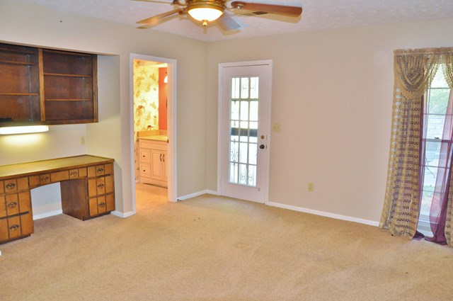 3915 Almond Road Fortson, GA 31808 - Photo 9 of 26 Master Suite with built in desk & door to back pat