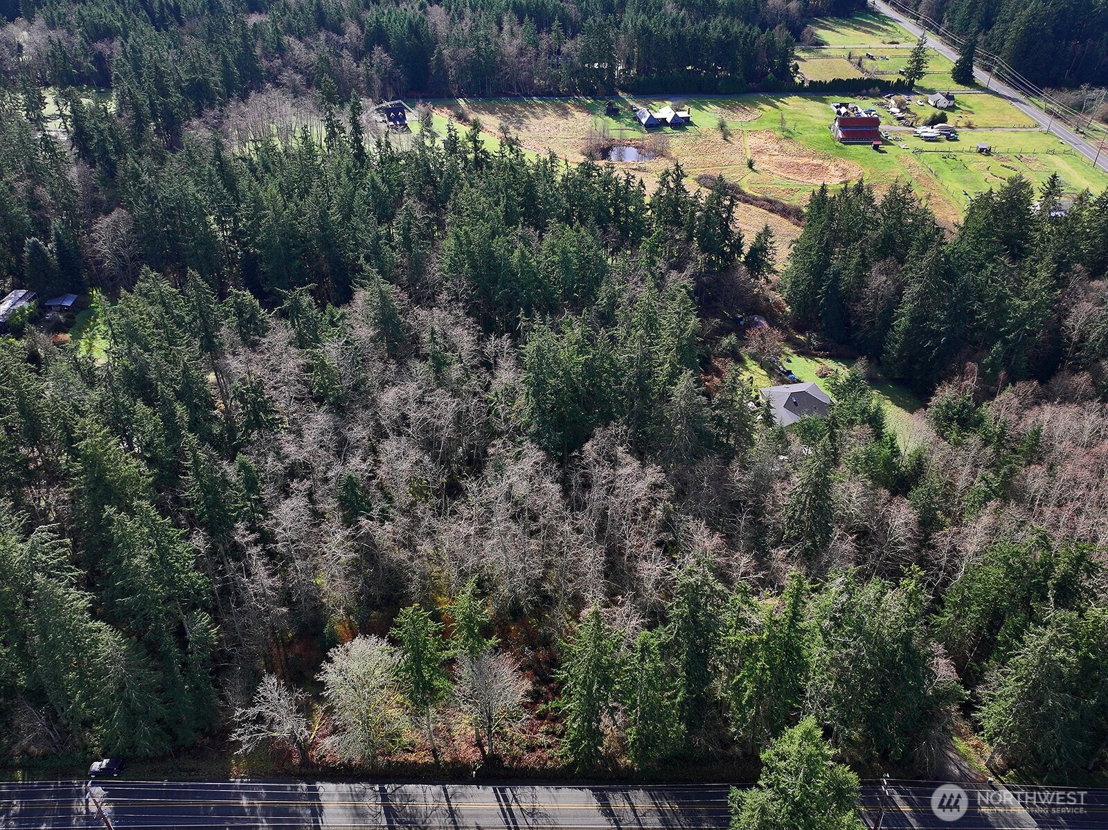 0 East Goss Lake Road Freeland, WA 98249 - Photo 11 of 18 an aerial view of a house with a yard