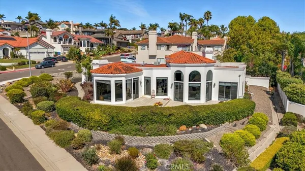 a front view of building with yard