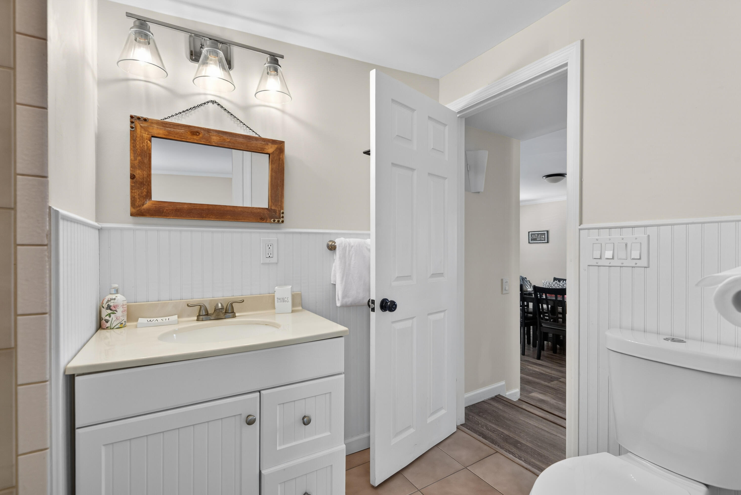 27 Riviera Drive Key West, FL 33040 - Photo 12 of 23 a bathroom with a sink a toilet and shower
