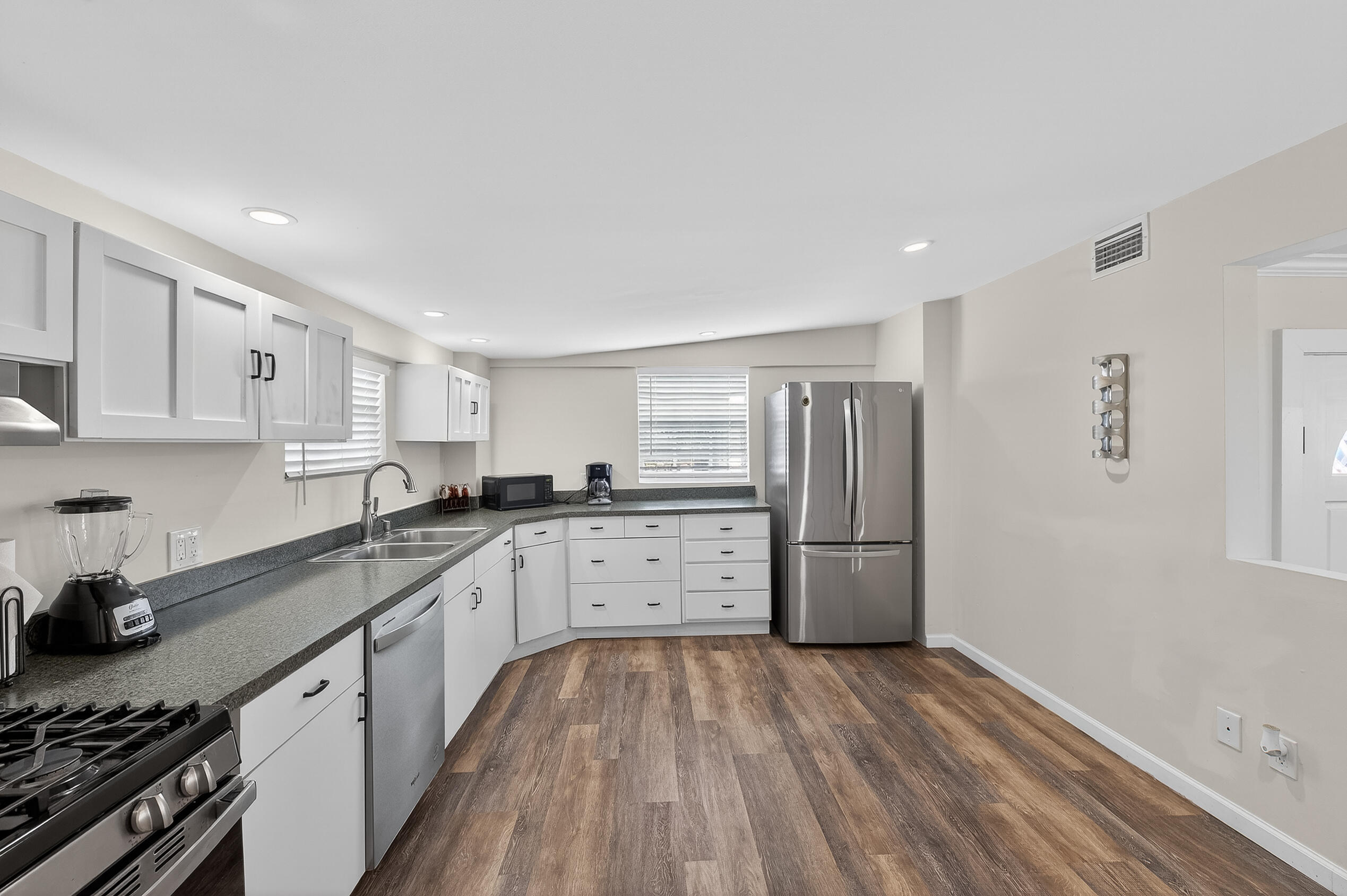 27 Riviera Drive Key West, FL 33040 - Photo 15 of 23 a kitchen with a sink stove and refrigerator