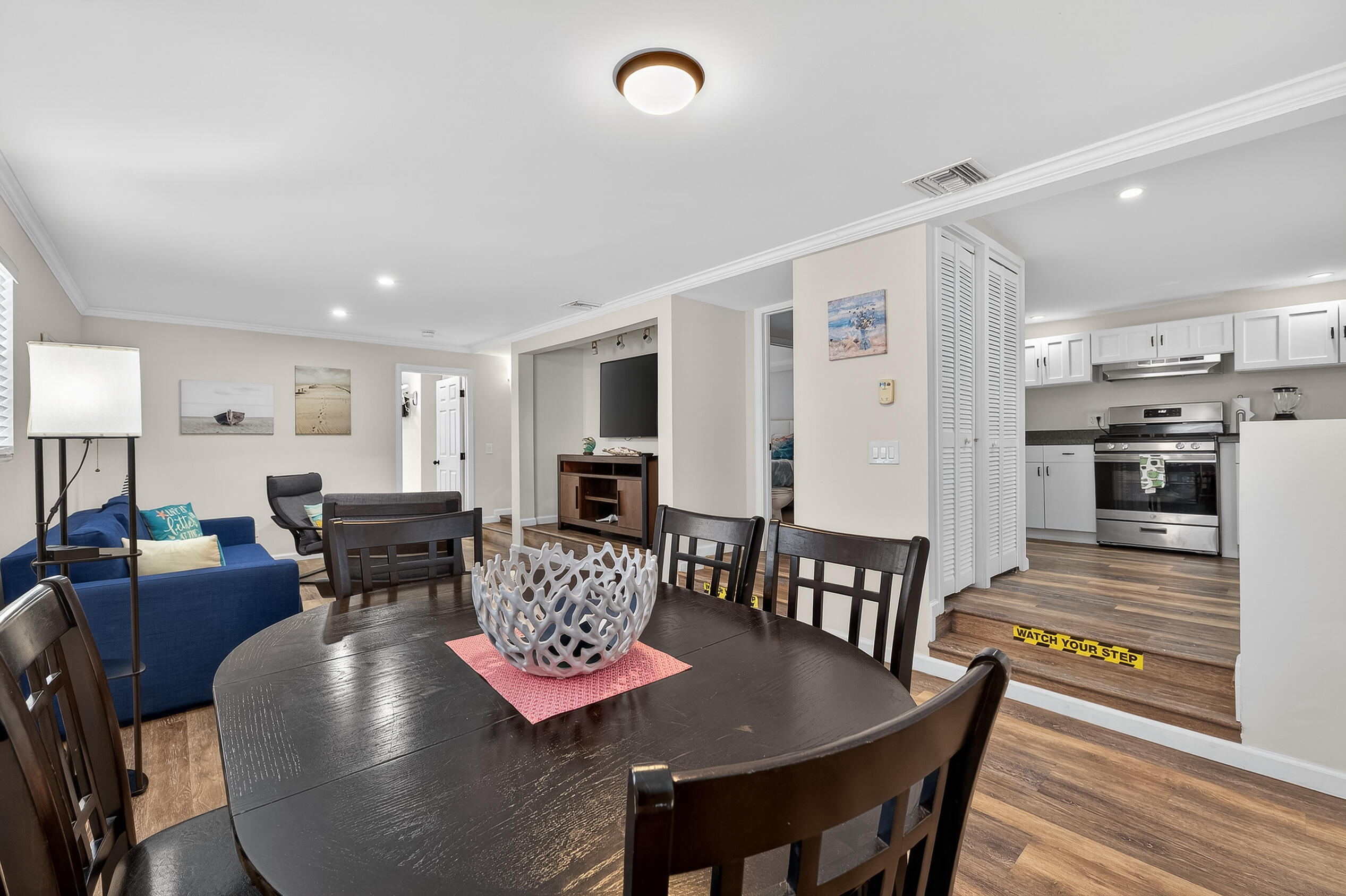 27 Riviera Drive Key West, FL 33040 - Photo 16 of 23 a living room with furniture kitchen view and a dining table