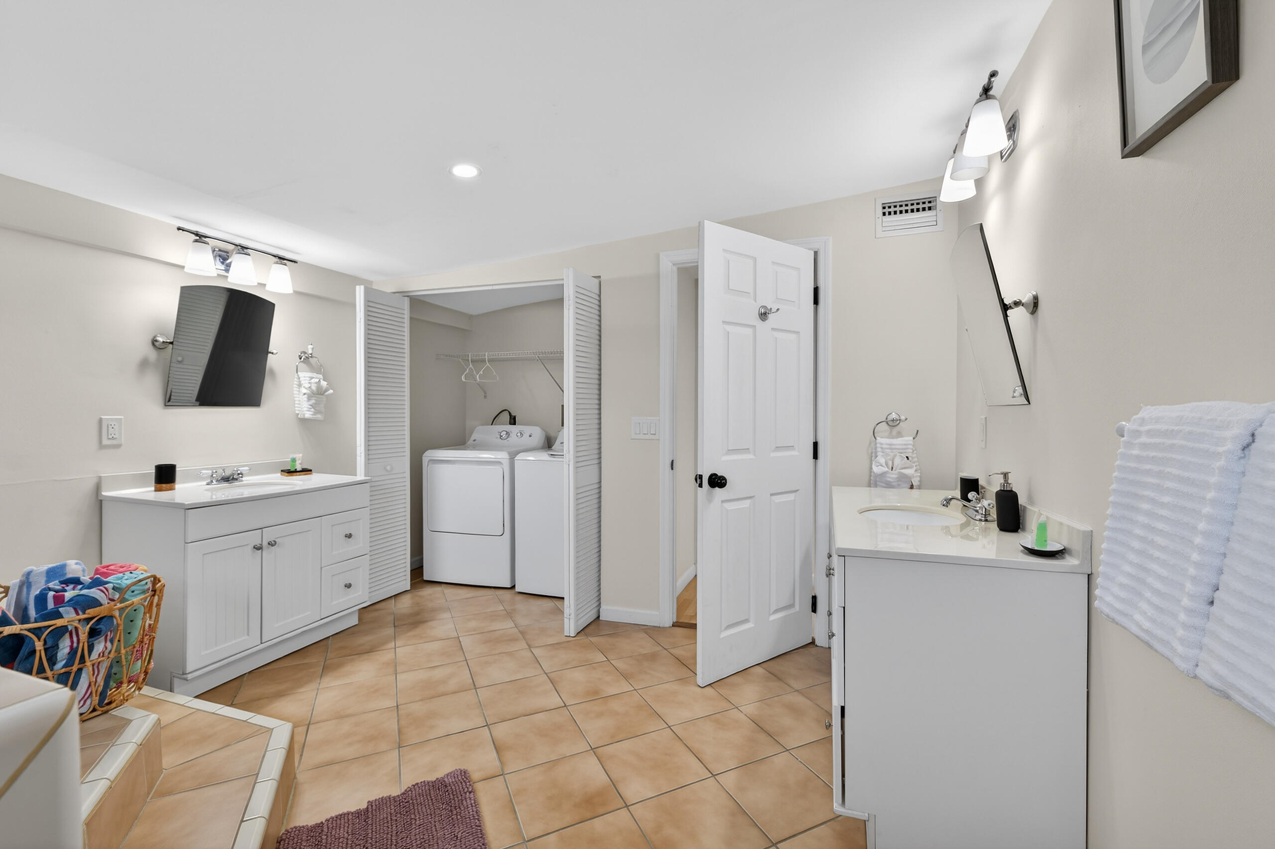 27 Riviera Drive Key West, FL 33040 - Photo 9 of 23 a bathroom with a sink a toilet and mirror