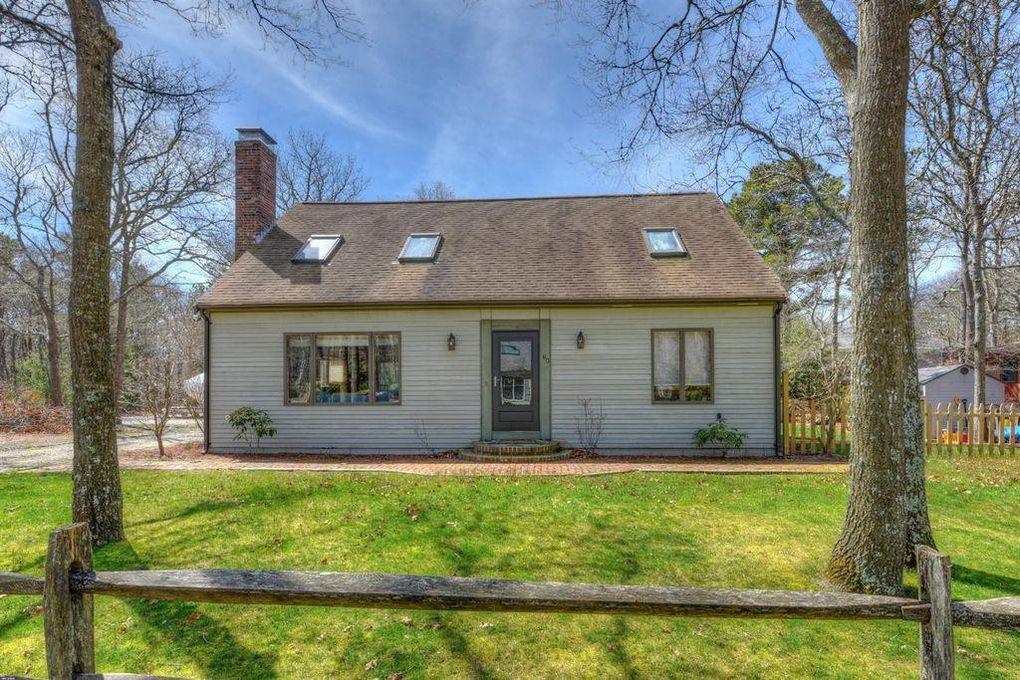 60 Neshobe Road Mashpee, MA 02649 - Photo 1 of 12 a view of house with front yard