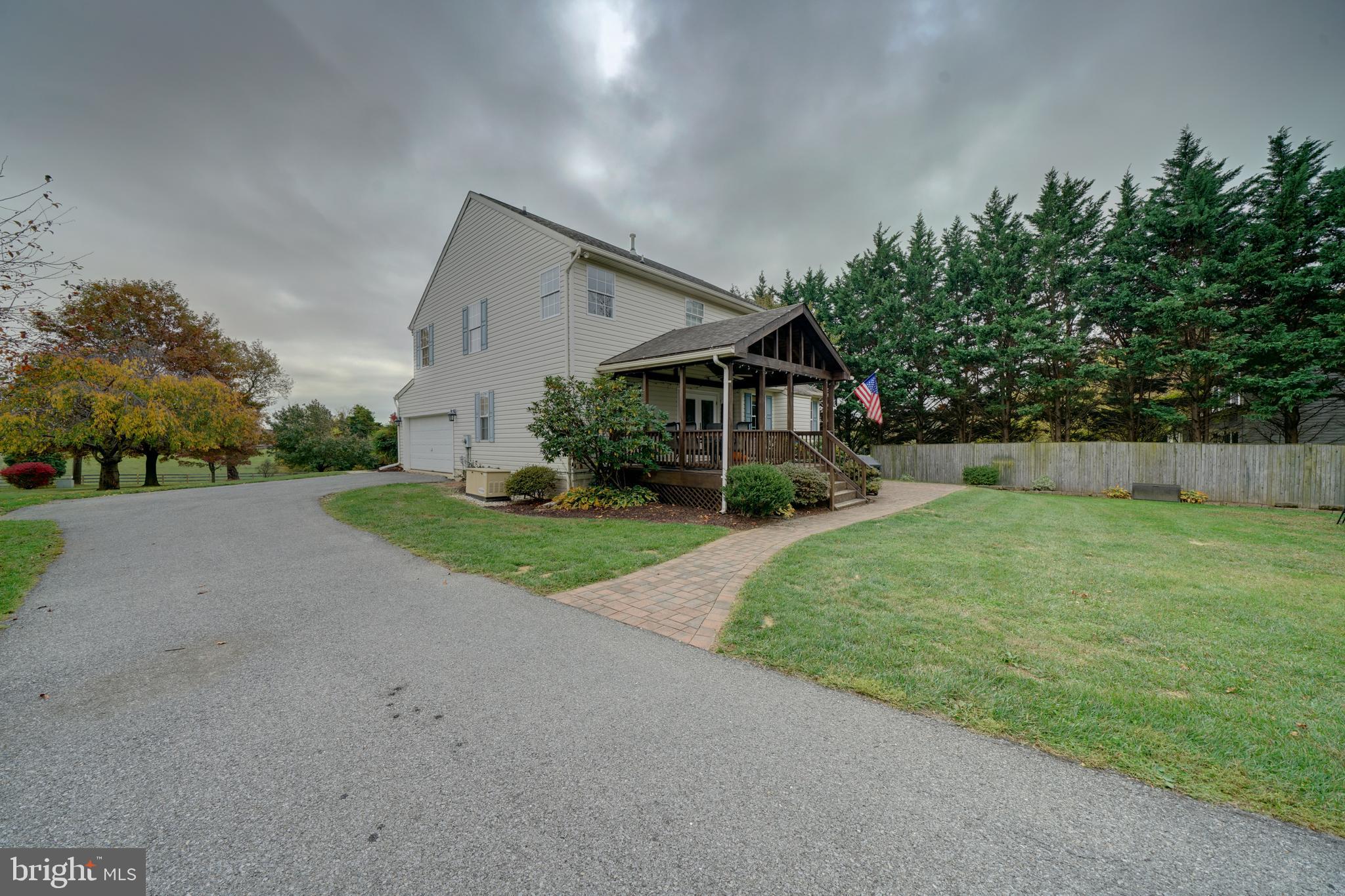 18560 Windsor Forest Road Mount Airy, MD 21771 - Photo 11 of 63 paver walk to deck