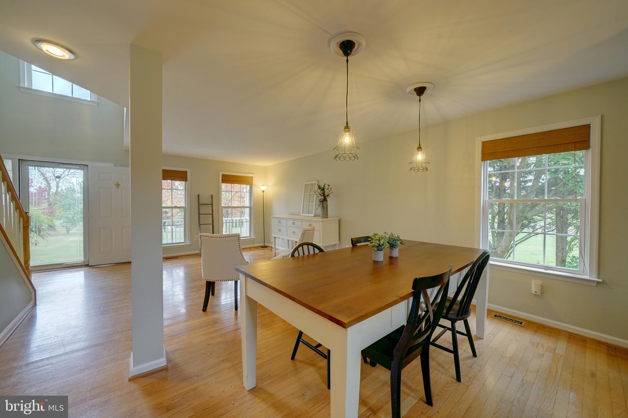 18560 Windsor Forest Road Mount Airy, MD 21771 - Photo 21 of 63 dining room through to living room