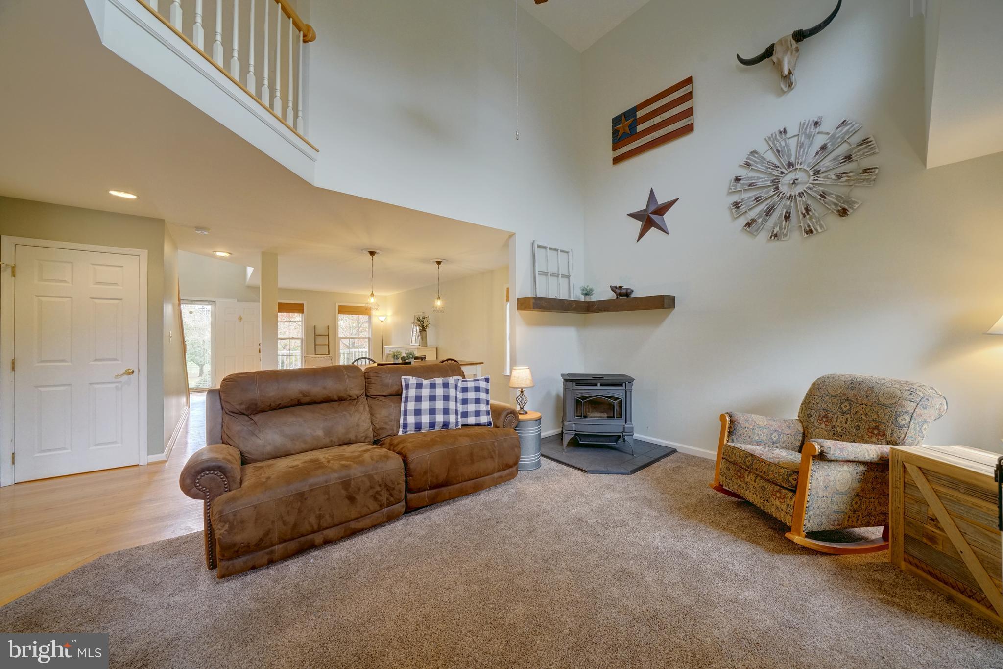 18560 Windsor Forest Road Mount Airy, MD 21771 - Photo 23 of 63 family room with pellet stove
