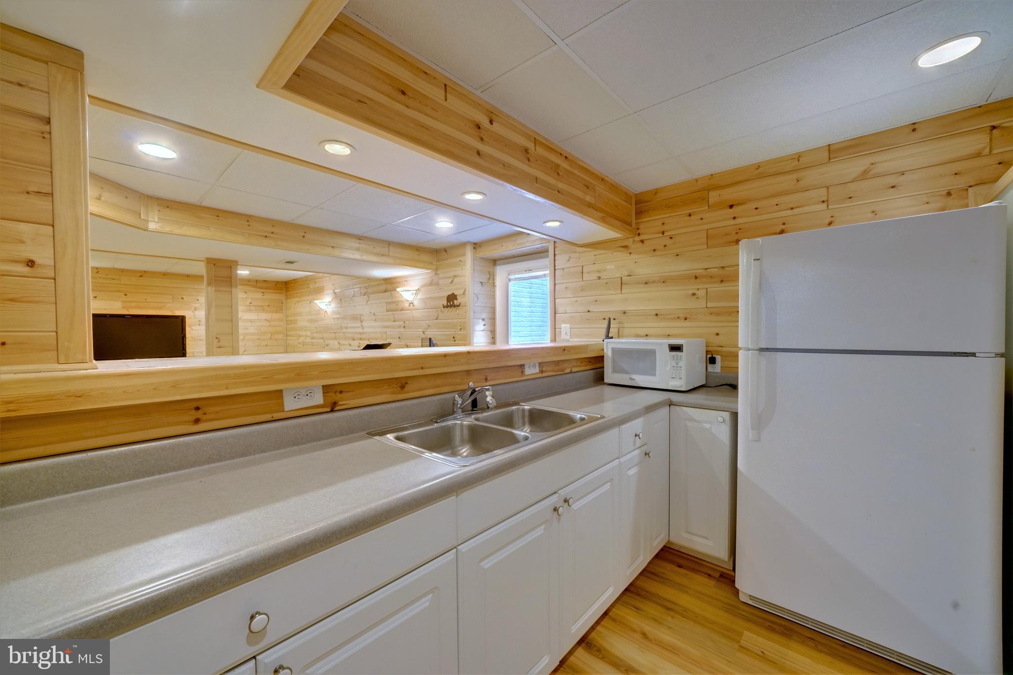 18560 Windsor Forest Road Mount Airy, MD 21771 - Photo 57 of 63 Basement wet bar full fridge