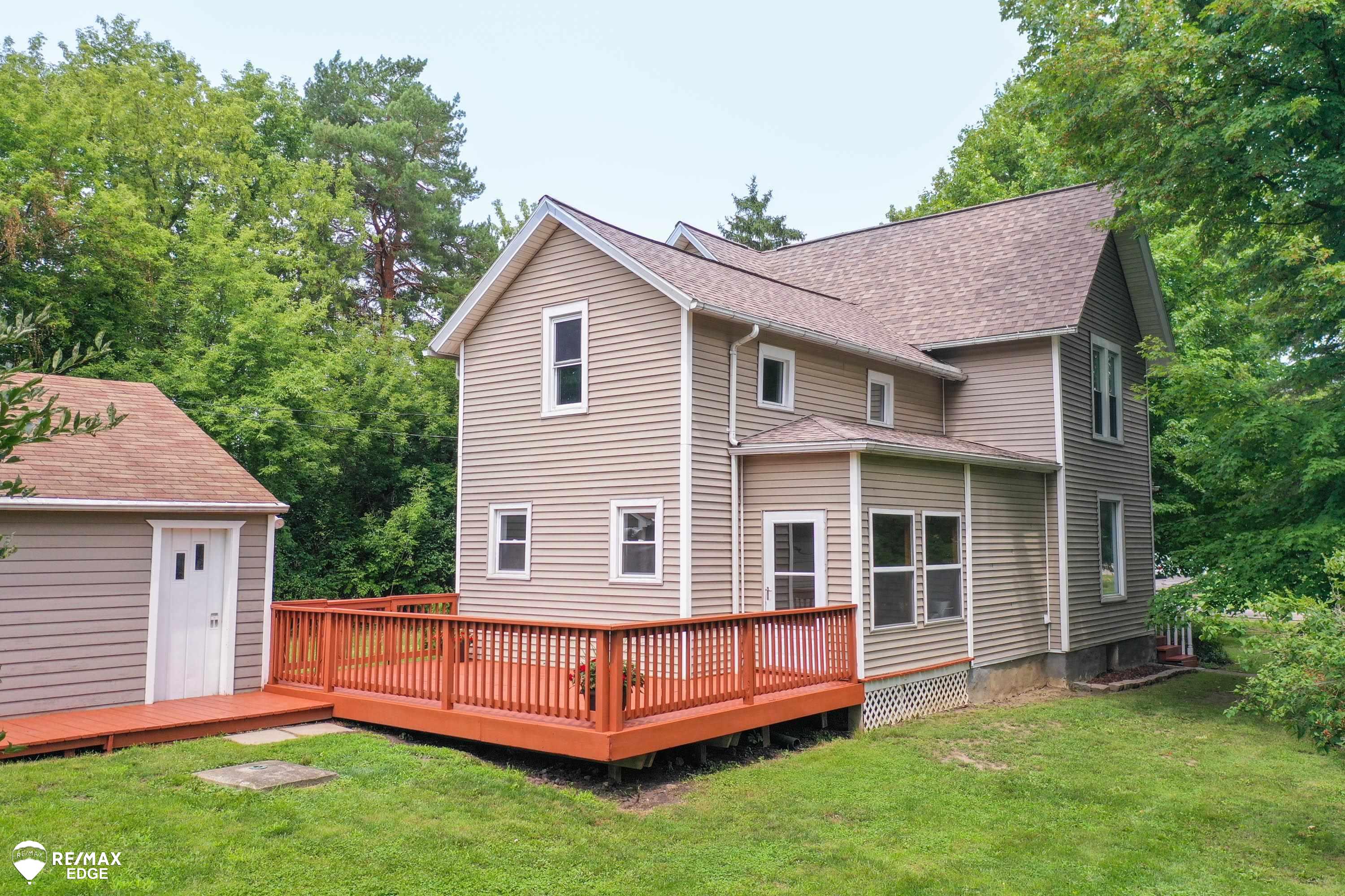 6231 Calkins Road Flint, MI 48532 - Photo 3 of 52 Back Deck on House