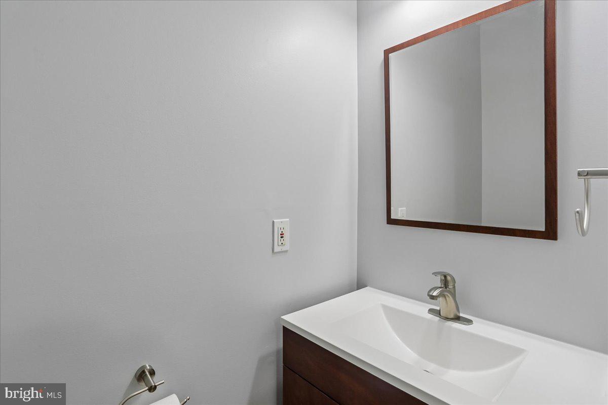 2943 St Helen Circle Silver Spring, MD 20906 - Photo 32 of 40 Sleek modern bathroom with elegance.