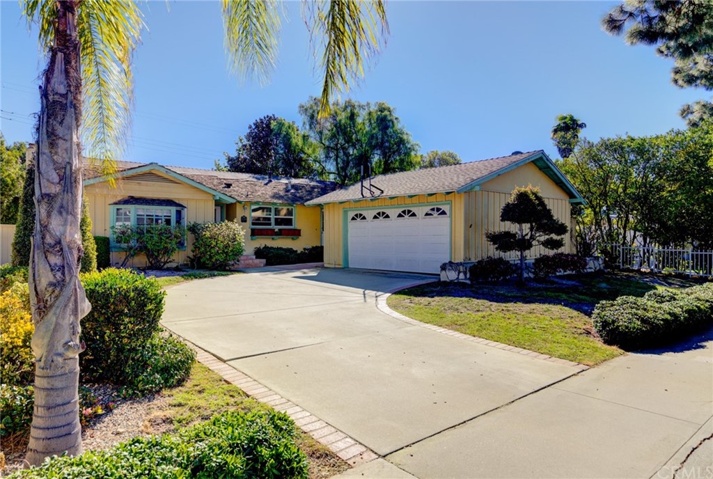 a front view of a house with swimming pool
