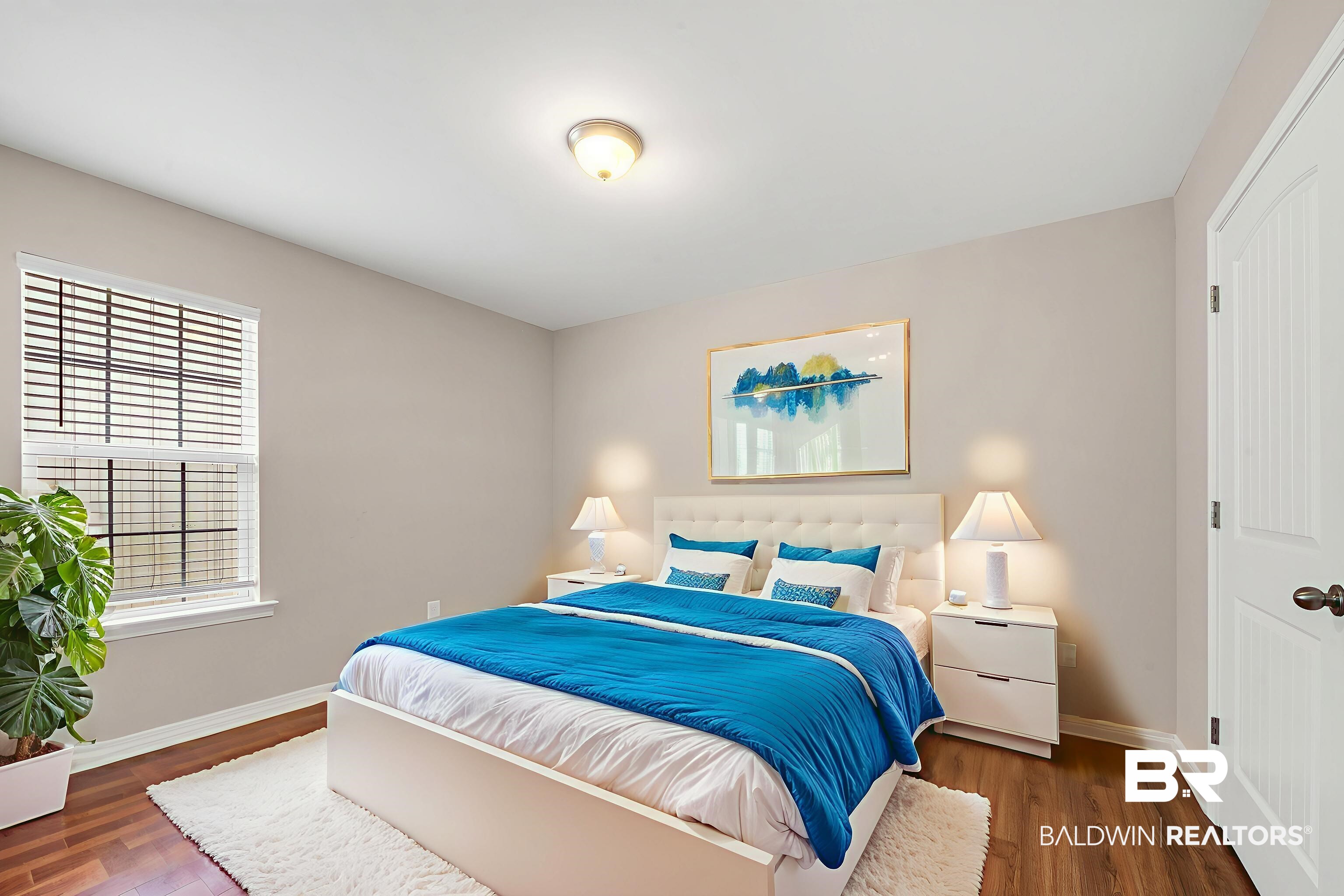 22810 Ard Road Robertsdale, AL 36567 - Photo 45 of 65 Bedroom with wood finished floors and baseboards
