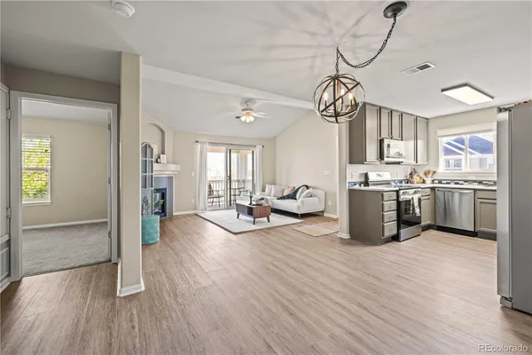 a view of a kitchen and dining room