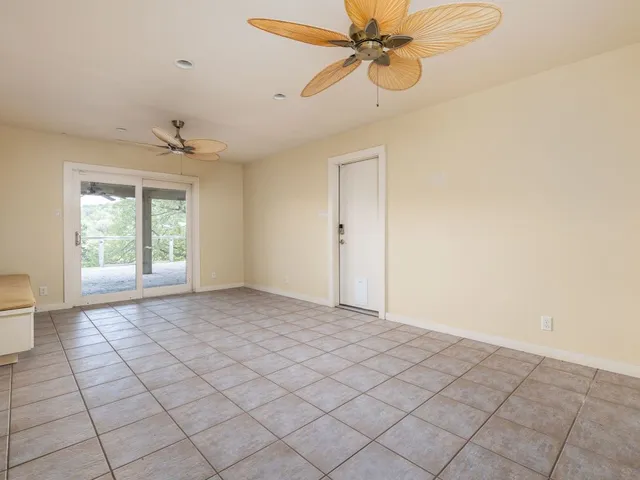 a view of an empty room and window