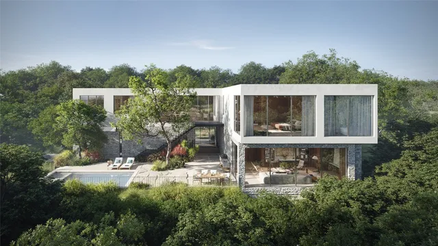 a view of house with yard and staircase