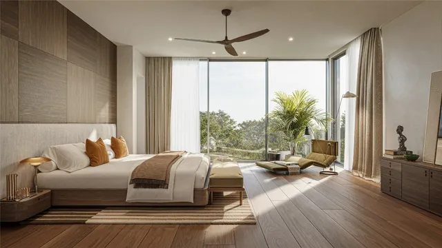 a bedroom with a large bed and a large window