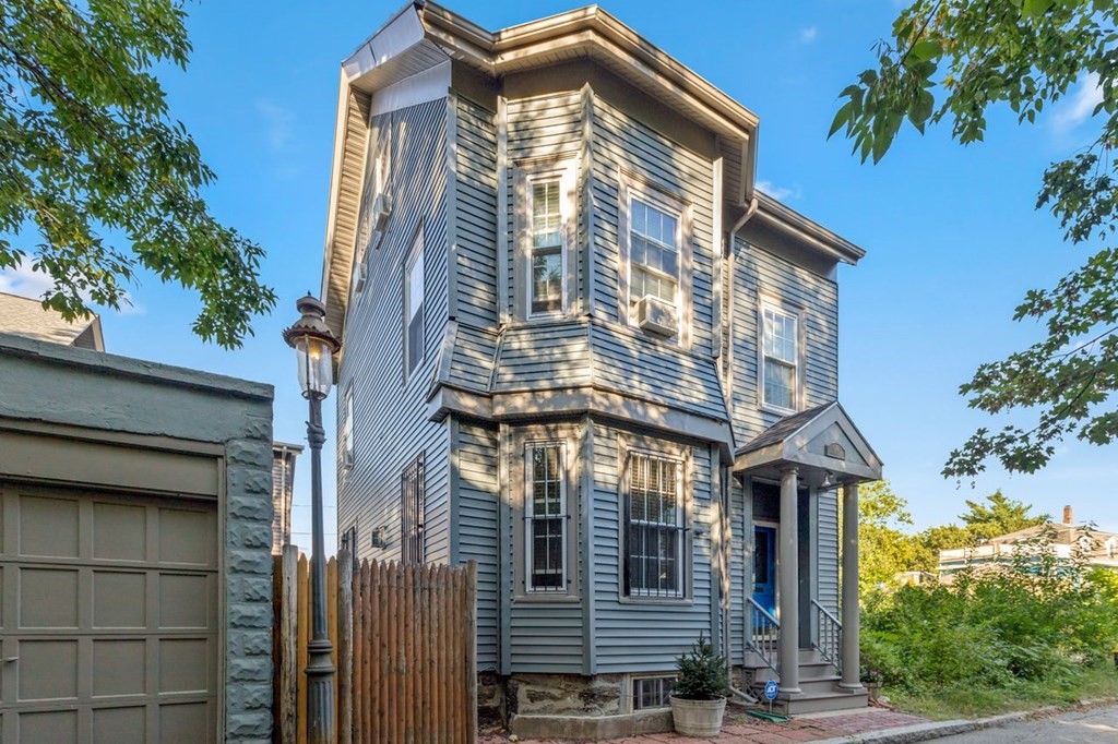 1 Copeland Place Boston, MA 02119 - Photo 4 of 31 a front view of a house