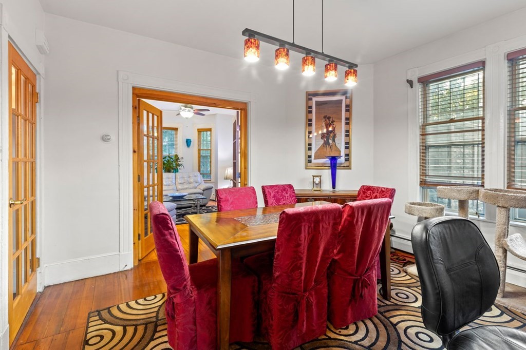 1 Copeland Place Boston, MA 02119 - Photo 10 of 31 a view of a dining room with furniture window and outside view
