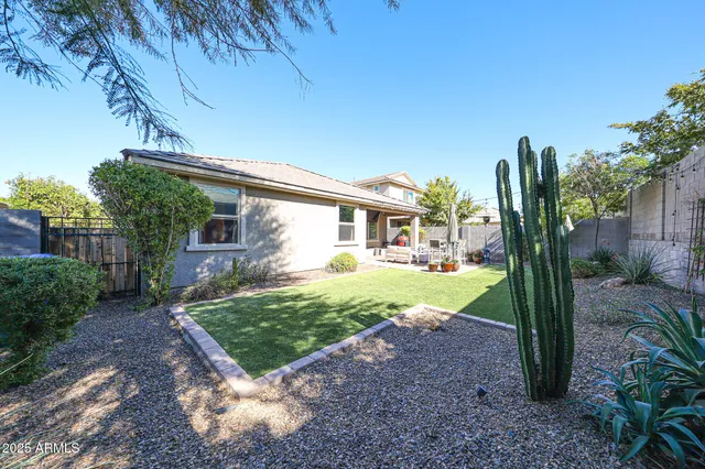 a view of a patio with couches chairs and a table